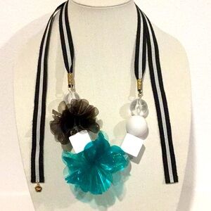 Trina Turk Elegant Floral Necklace with Black and Teal Accents unique piece.